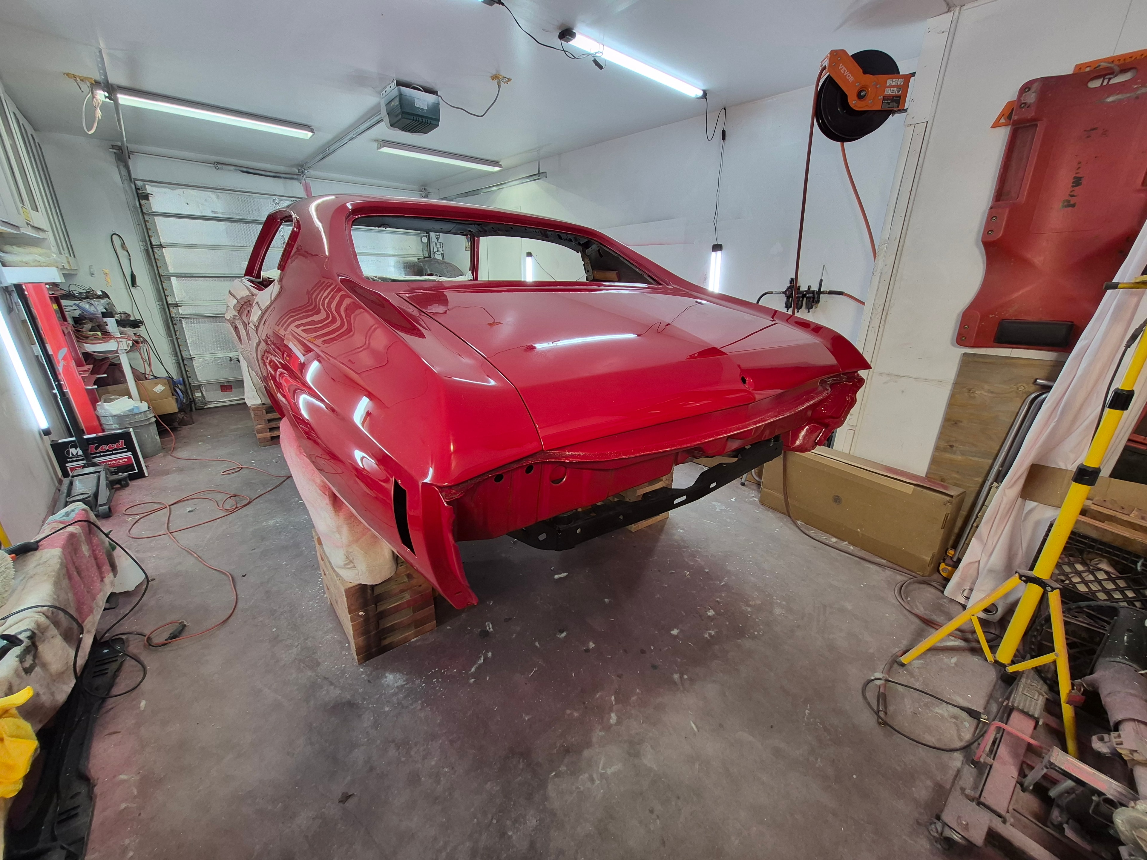 1972 Chevelle Malibu freshly painted body on stands in the garage
